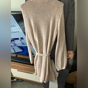 Pink sweater dress with speckled color